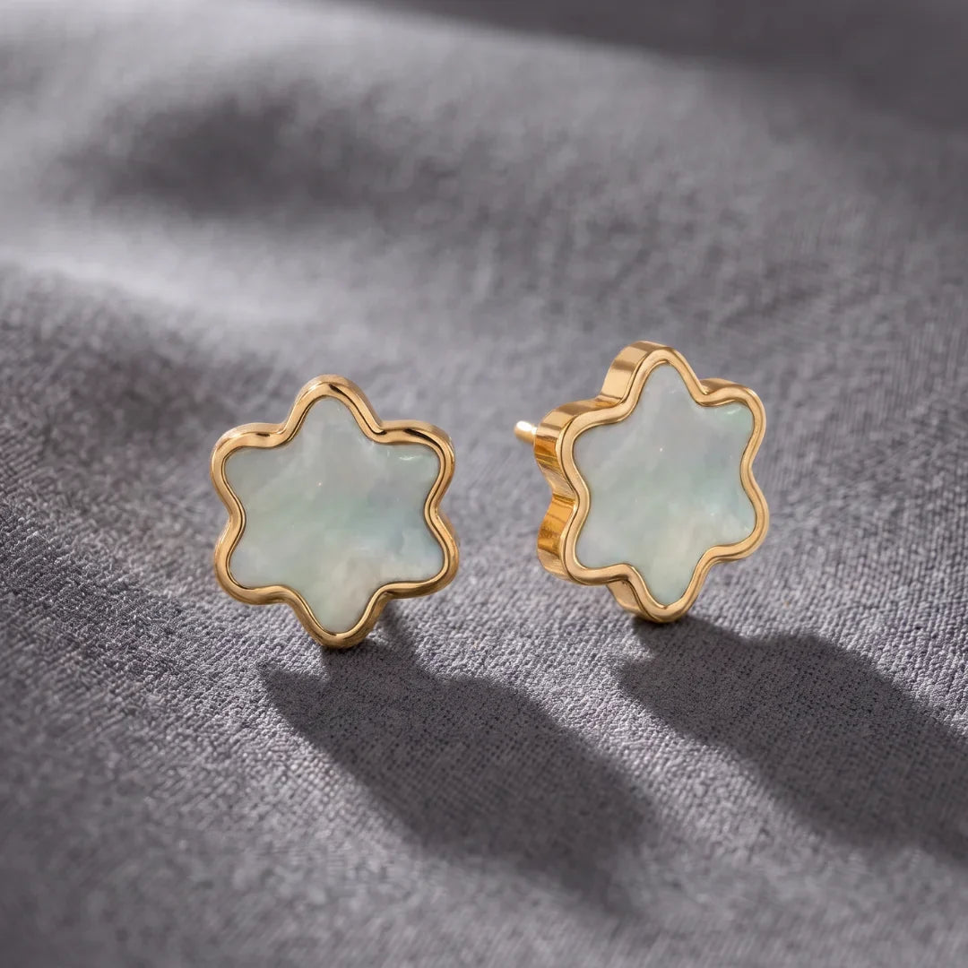 Tyferet Symbol Mother of Pearl earrings on textured fabric